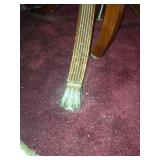 Reeded leg and paw foot of dining room table