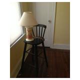 Tall chair and small lamp