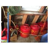 Several five-gallon gas cans.