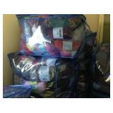 Just a few of the approximately 50 storage totes packed with all kinds of yarn.