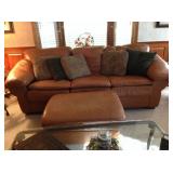 Caramel leather sofa and ottoman