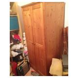 Armoire in unfinished pine.