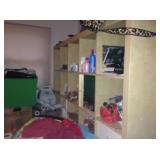 This storage unit has an attached desk.