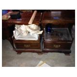 Nightstands. The left one contains picture frames