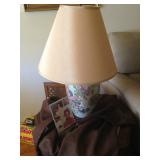 Lamp on octagonal table.