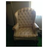 Tufted armchair.