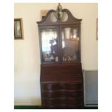 Secretary with glass doors.