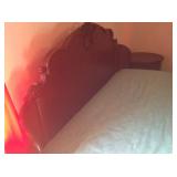 Wrap-around headboard. Sun glare obscures details, must see.