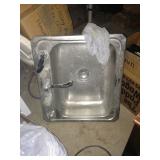 One of two kitchen sinks.