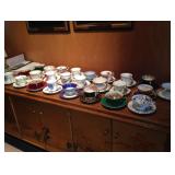 Collection of 25 different tea cups