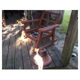 wooden patio chair and bell