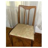 One of the dining room table chairs