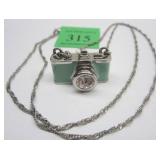 PENDANT NECKLACE IN THE FORM OF A CAMERAPhoto Description
