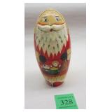 SET OF FOUR CHINESE NESTED SANTA DOLLS, PAINT AS ISPhoto Description