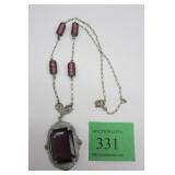 NECKLACE WITH PURPLE GLASS STONESPhoto Description