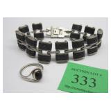STERLING SIZE 5 1/4 RING AND A STAINLESS STEEL LINK BRACELETPhoto Description
