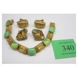 TWO PAIRS OF CLIP ON EARRINGS AND A LINK BRACELET SIGNED "ART"Photo Description