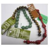 THREE BEAD GALLERY STRINGS OF BEADS: TIGER