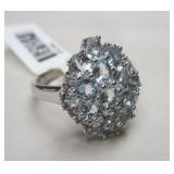 CHINESE RING WITH AQUAMARINE COLORED STONES MARKED 925. SIZE 9Photo Description