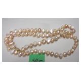 PINK BAROQUE PEARL NECKLACE WITH CLASP MARKED 14KPhoto Description