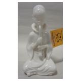WHITE PORCELAIN FIGURE OF A MONK WITH FLUTE, 5" TALL