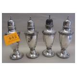 SET OF FOUR F.B. ROGERS STERLING SHAKERS. 4.86 TROY OZ. ONE NEEDS POLISHING, SOME DENTS