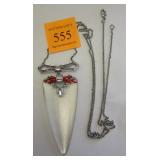 ALEXIS BUNAR PENDANT NECKLACE. MISSING ONE STONE. PENDANT IS 3.25"