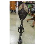 AFRICAN ELONGATED WOOD FIGURE WITH STAMPED METAL CROWN. 30" TALL