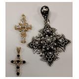 gold and silver corss pendants