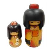 TWO KOKESHI DOLLS