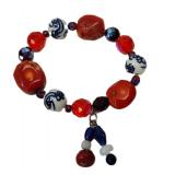      Seller     History  STRETCH BRACELET WITH RED CORAL, FACETED GLASS AND CHINESE BLUE & WHITE POR