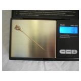 Diamond and gold stick pin