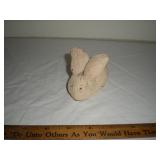 Pink eyed bunny figure