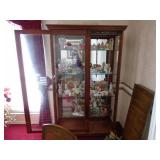 Amazing lighted curio cabinet