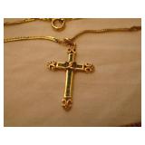 Gold and emeralds cross