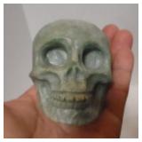 Green soapstone skull