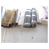 Throw rugs and many larger rugs 