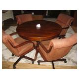 Oval table w/4 plush rolling chairs and a pop-up leaf $250