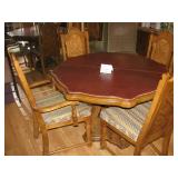 Dining table with 4 chairs and pad $150