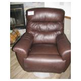 This leather swivel, rocker/recliner is yummy. Orig.$1,900, Now $500