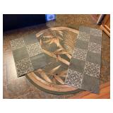 Three beige & green rugs