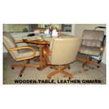MODERN WOOD TABLE, LEATHER ROLLING CHAIRS