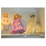 SOME OF THE PORCELAIN DOLLS BEING SOLD