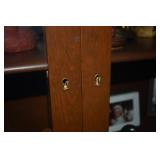 KEY PORT TO LOCK THE BOOKCASE CABINET