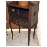 THE PHONE STAND WITH STORAGE AREA