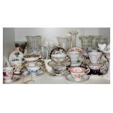 SOME OF THE CUPS AND SAUCER SETS