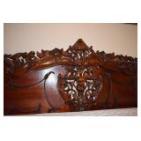 ORNAMENTATION ON THE HEADBOARD, CLOSEUP