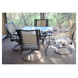 PATIO TABLE AND FOUR COMFORTABLE CHAIRS