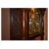 SIDE VIEW SHOWING SCROLLWORK ADORNING SOUND CHAMBER