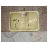 SIGNATURE LABEL ON SOFA